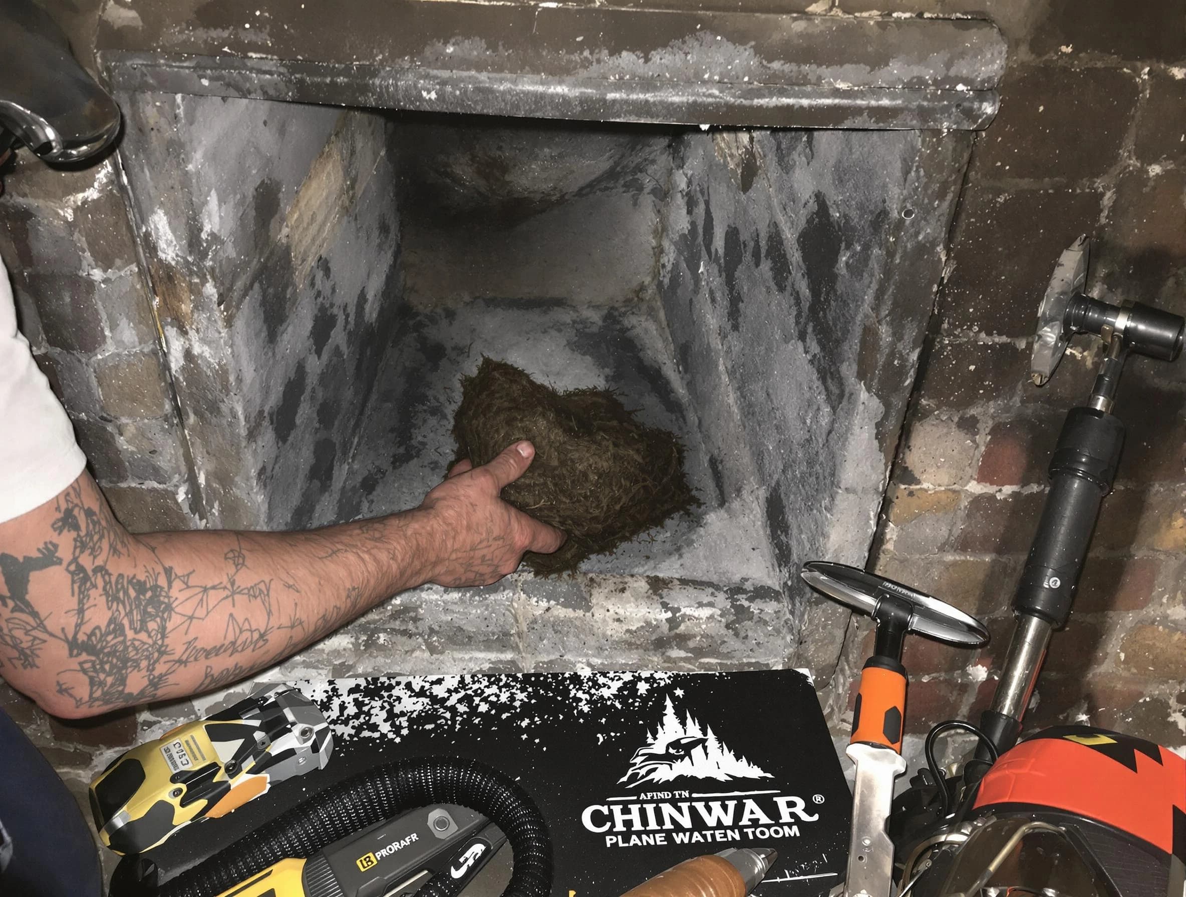 Glen Allen Chimney Sweep safely removing debris and screening chimney in Glen Allen, VA